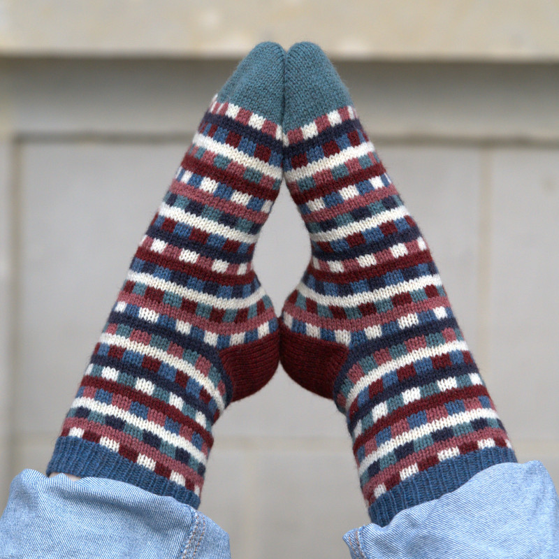 All over colorwork sock that are perfect to use up scrap yarn.