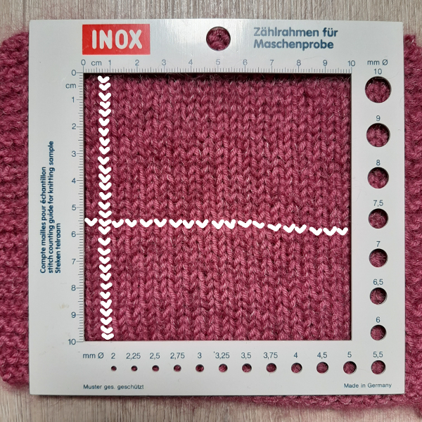 A image showing how to count the stitches of a gauge swatch.