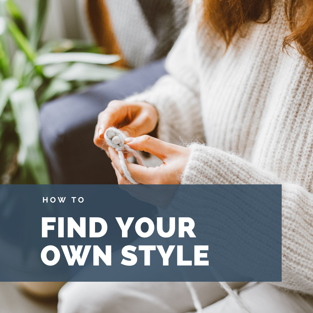 A knitting person in a white sweater.